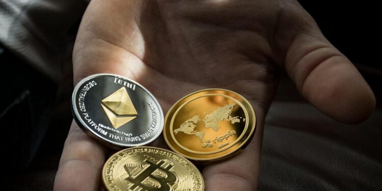 Ripple logo alongside UK flag and financial icons representing crypto payments.