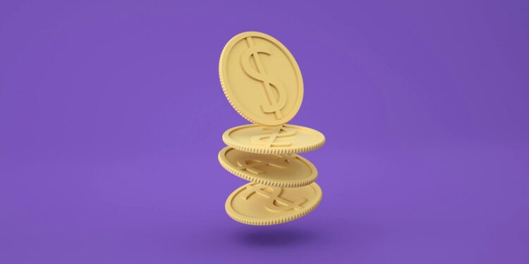 A digital graphic showing a growing stack of coins with a globe symbolizing cross-border finance.