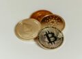 Cryptocurrency coins with Iranian flag, symbolizing Iran's growing crypto market amidst sanctions.