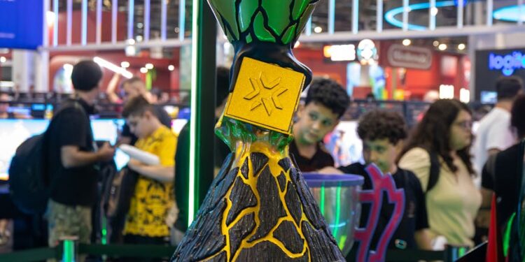 Crowd at blockchain hub launch event, showcasing Solana branding and tech displays.