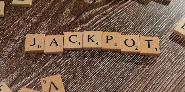 Two miners celebrating with cash and cryptocurrency symbols after winning jackpots.