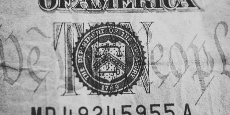 A graphic showing cryptocurrency symbols with a U.S. Treasury seal and sanctions text.