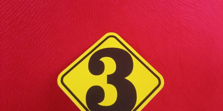 A graphical representation of cryptocurrency symbols with a caution sign overlay.