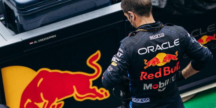 Nexo logo displayed alongside Audi F1 Team branding at a racing event.