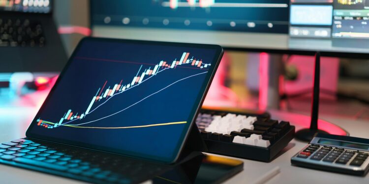 Computer screen displaying cryptocurrency charts and data analysis tools.