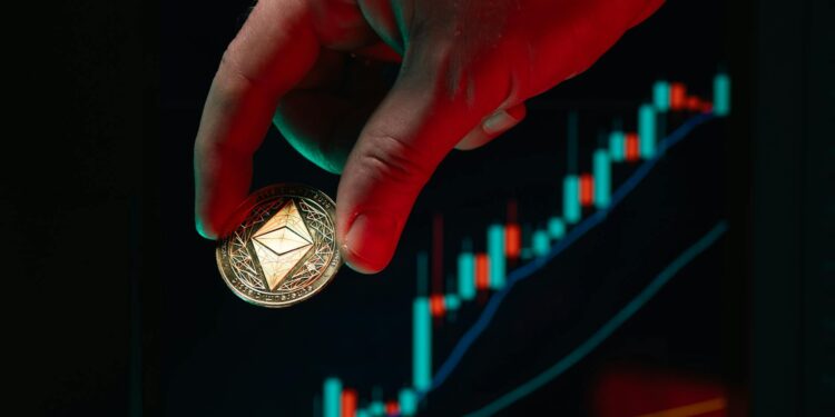 Trump speaking at a podium with financial charts and crypto symbols in the background.