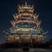 China's central bank building with gold bars, symbolizing extended gold purchases.