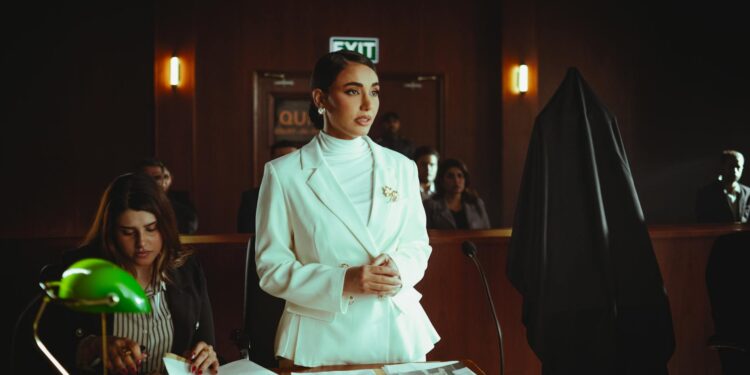 A courtroom scene with lawyers discussing crypto fraud case details.