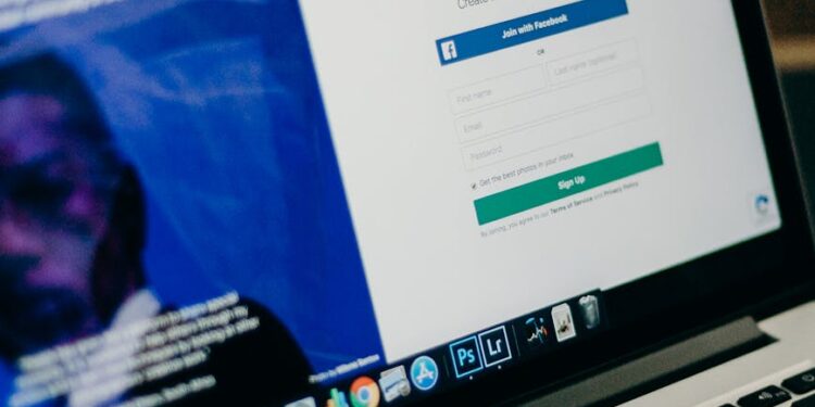 A computer screen displays a phishing email targeting Ledger cryptocurrency users.