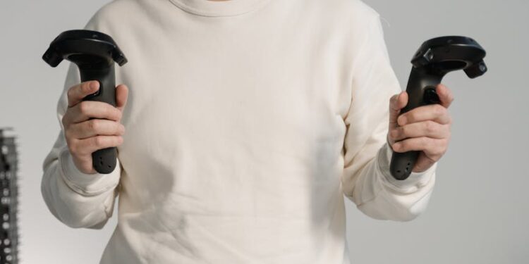 Employees working in the Meta Reality Labs office, with technology and VR equipment visible.