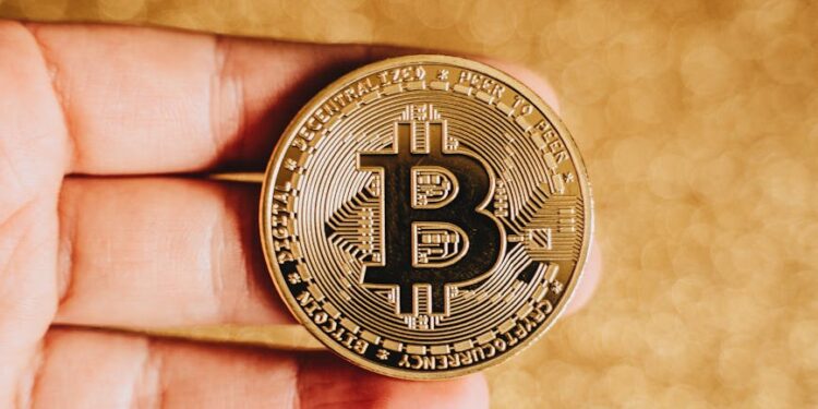 A close-up of a cryptocurrency coin with regulatory documents in the background.