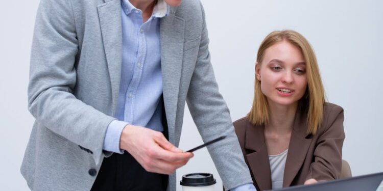 A financial executive discussing crypto accounting solutions at a conference.