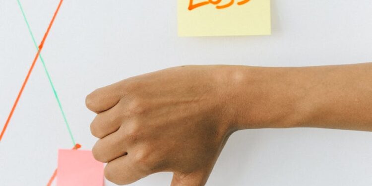 Zcash logo with a downward graph trend, symbolizing market decline and team layoffs.