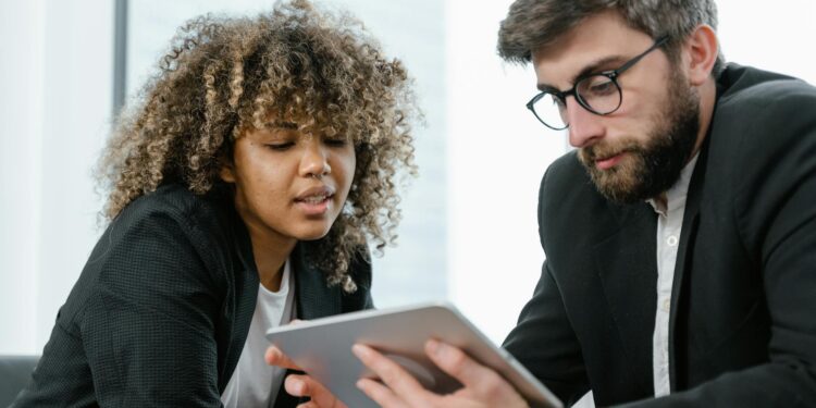 A graph showing rising stablecoin usage alongside a mobile wallet and digital currency icons.