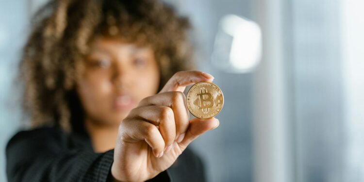 XRP coin displayed with a rising graph and Bitcoin symbol, highlighting market gains.