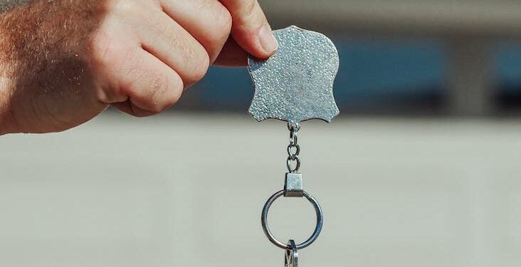 Coincheck and 3iQ logos with financial charts, symbolizing the crypto acquisition deal.