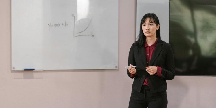 Tim Draper speaking at a finance conference, discussing Bitcoin lending opportunities.