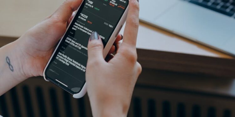 A trader using Jupiter's Mobile V3 app with advanced pro trading features on a smartphone.