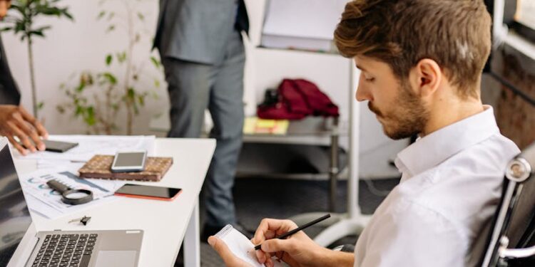 Musk presenting xAI with Nvidia and Cisco logos in a tech-focused conference setting.