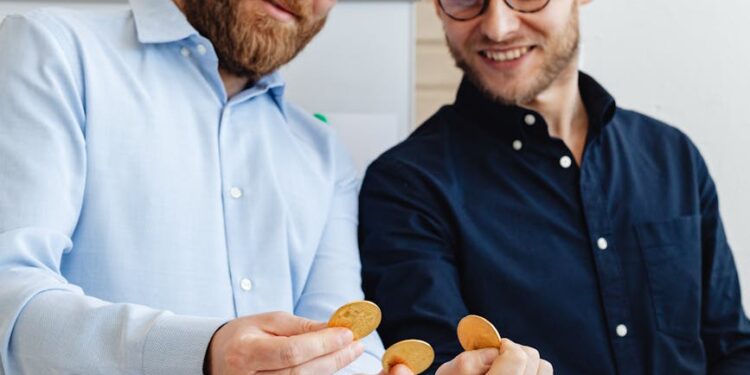 Employees in a modern office discussing strategies amidst cryptocurrency market changes.