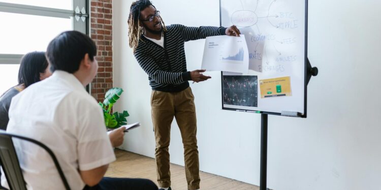 Two business professionals discussing Bitcoin investment strategies at a conference.