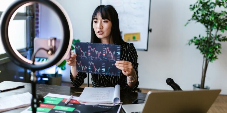 Graph showing surging inflows for Bitcoin and Ether ETFs, highlighting record investment trends.