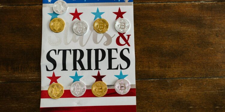 Cryptocurrency coins including Bitcoin, Ether, and Dogecoin against a financial graph background.