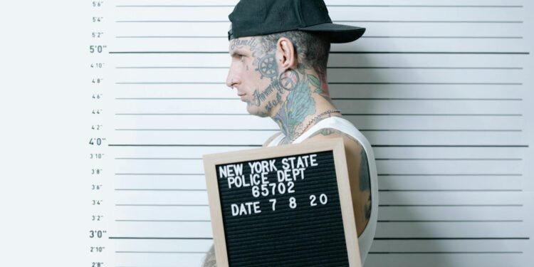 Police detain a suspect linked to a cryptocurrency scam in Cambodia.