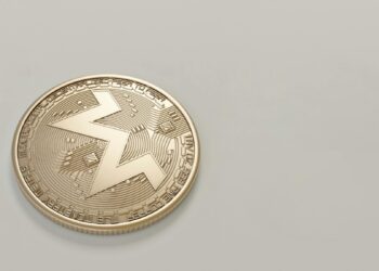 A digital representation of cyber currency with a padlock and Russian flag background.