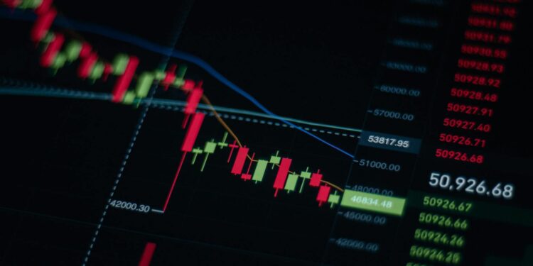 Digital chart showing a downward trend in cryptocurrency values with bearish indicators.