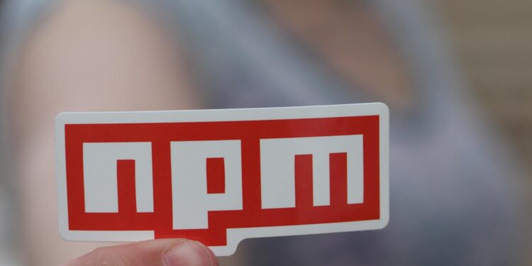 Developers collaborating on smart contract security with EVMbench software tools.