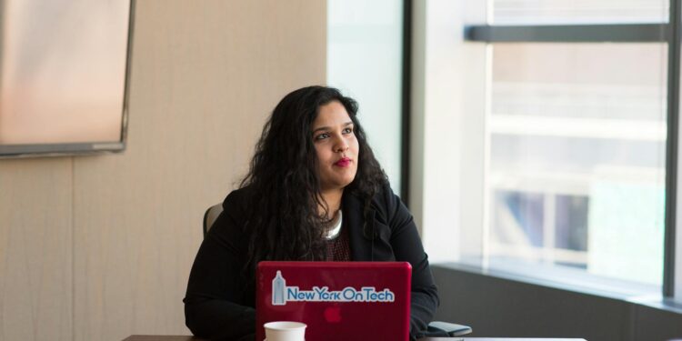 Robinhood executives presenting new Layer 2 blockchain technology at a tech conference.