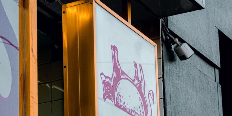 A graphic illustrating MetaMask and Ondo logos with stock market imagery.