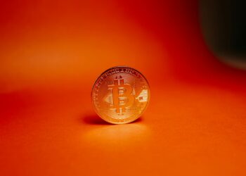 Crypto trading graphic featuring blockchain symbols and financial charts.