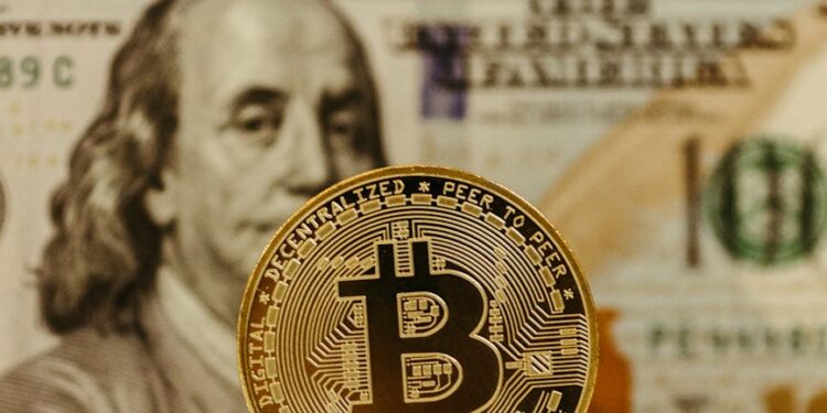 A gavel rests on a table beside a cryptocurrency coin, symbolizing legal action in finance.