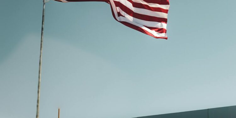 Coinbase logo juxtaposed with Nevada state outline and regulatory symbols.