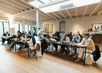 Group of fintech representatives discussing stablecoin regulations.