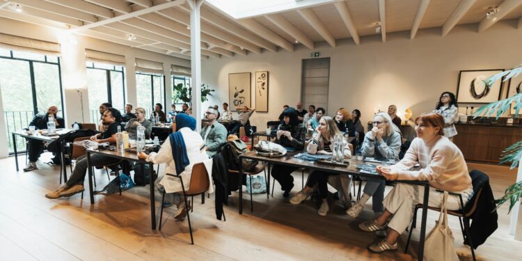 Group of fintech representatives discussing stablecoin regulations.