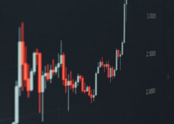 A financial executive presenting charts related to DeFi growth and investment opportunities.