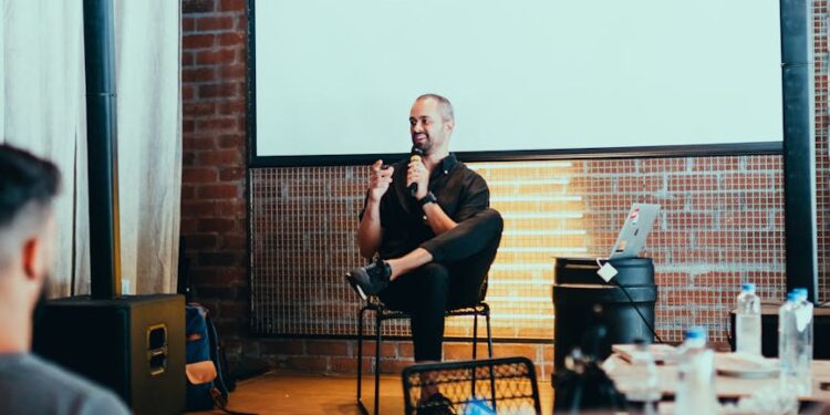 Charles Hoskinson speaking at a conference, discussing Cardano's LayerZero partnership.