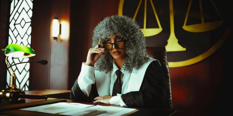 A courtroom scene showing a foreign national during a crypto fraud hearing.