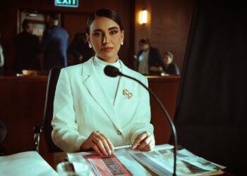 Founders of Dragonfly Capital debating over firm's crypto origins at a conference.