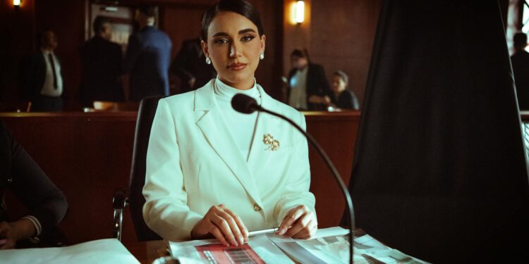 Founders of Dragonfly Capital debating over firm's crypto origins at a conference.