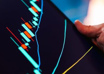 A fluctuating crypto chart displays WLFI's instability amid market turbulence.