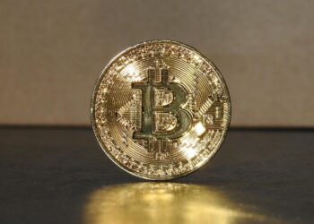 A digital graphic showing Bitcoin with a privacy shield symbol, emphasizing crypto security.