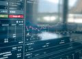 Changpeng Zhao speaking at a conference on cryptocurrency market volatility and trader accountability.