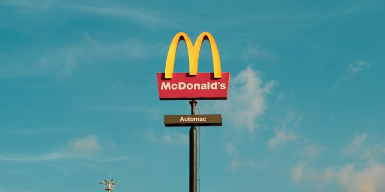 Tether logo alongside LayerZero Labs logo, symbolizing a partnership in cross-chain technology.