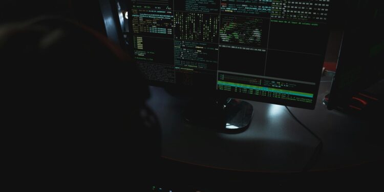 Close-up of a computer screen displaying code and suspicious plugins linked to crypto security.