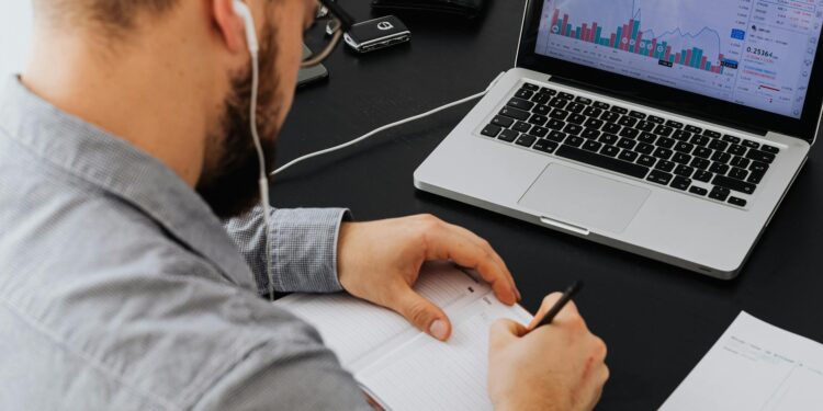 Coinbase logo displayed over a digital backdrop of cryptocurrency charts and graphs.