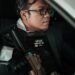 FBI agents in tactical gear arrest a man outside a tech office, dark web implications looming.